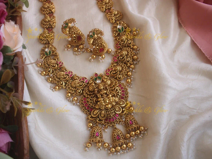 Grand Intricate gold alike Jadau Lakshmi and peacock carved long necklace with gold beads - Sparkle and Glow
