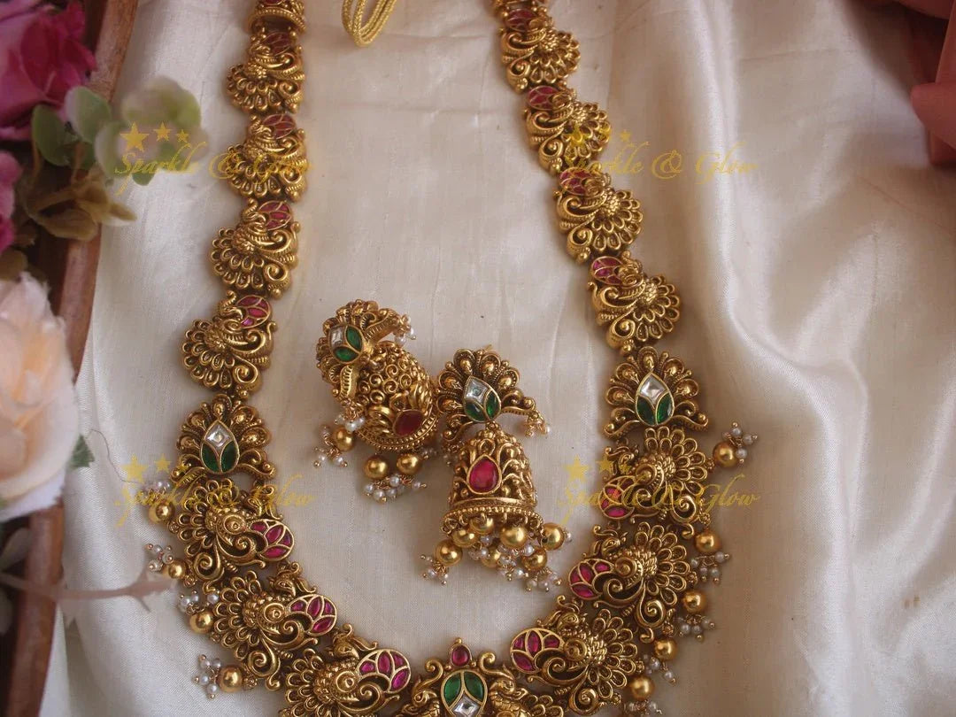 Grand Intricate gold alike Jadau Lakshmi and peacock carved long necklace with gold beads - Sparkle and Glow