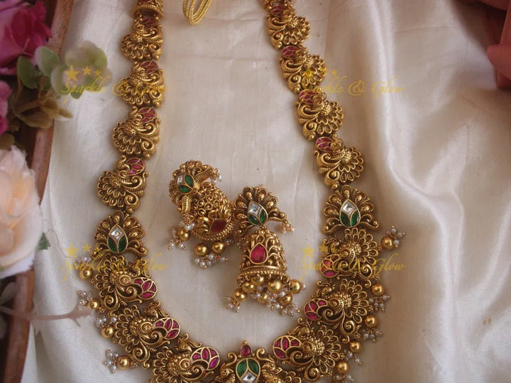 Grand Intricate gold alike Jadau Lakshmi and peacock carved long necklace with gold beads - Sparkle and Glow