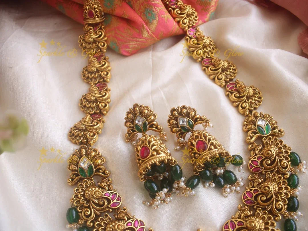 Grand Intricate gold alike Jadau Lakshmi and peacock carved long necklace with gold beads - Sparkle and Glow