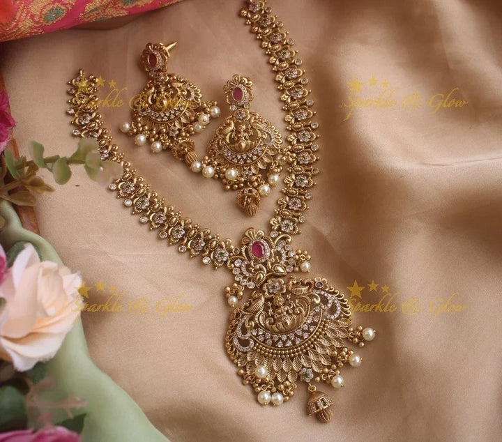 Stunning premium dull matte finish Lakshmi and peacock carved short necklace with cz stones and pearls - Sparkle and Glow