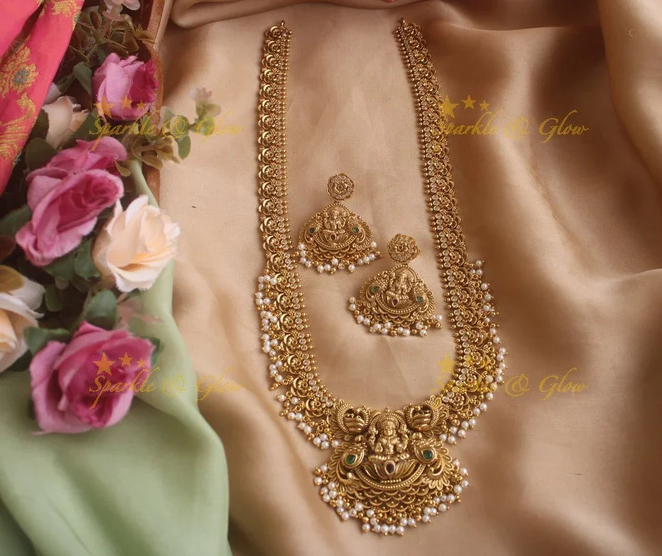 Stunning gold alike Lakshmi and peacock carved long gutta pusalu necklace with cz stones - Sparkle and Glow