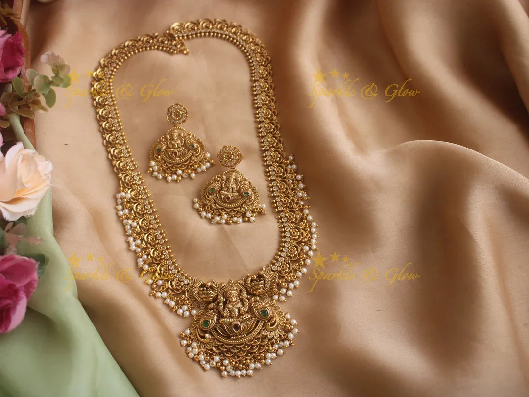 Stunning gold alike Lakshmi and peacock carved long gutta pusalu necklace with cz stones - Sparkle and Glow