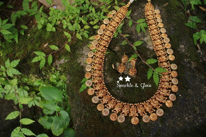 Gold alike polished peacock style lakshmi coin haram with stones - Sparkle and Glow