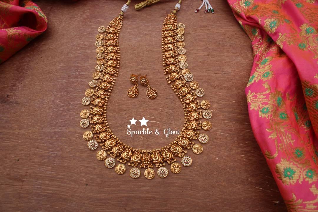Gold alike polished peacock style lakshmi coin haram with stones - Sparkle and Glow