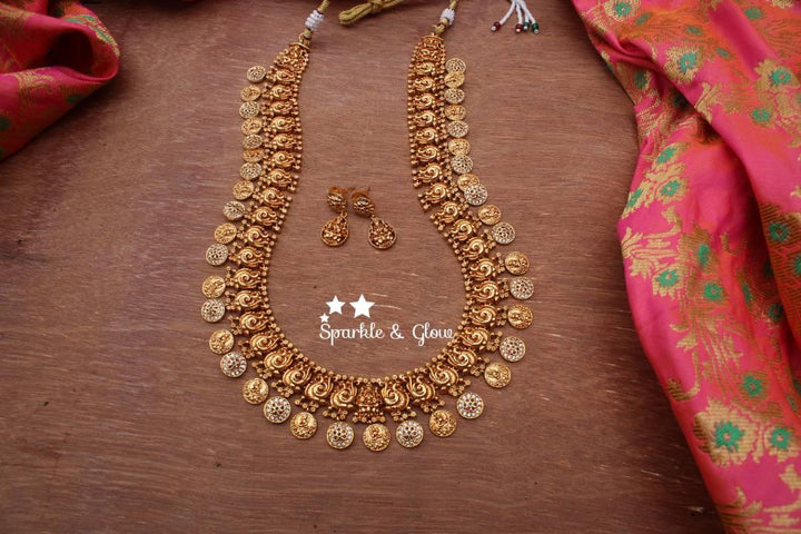 Gold alike polished peacock style lakshmi coin haram with stones - Sparkle and Glow