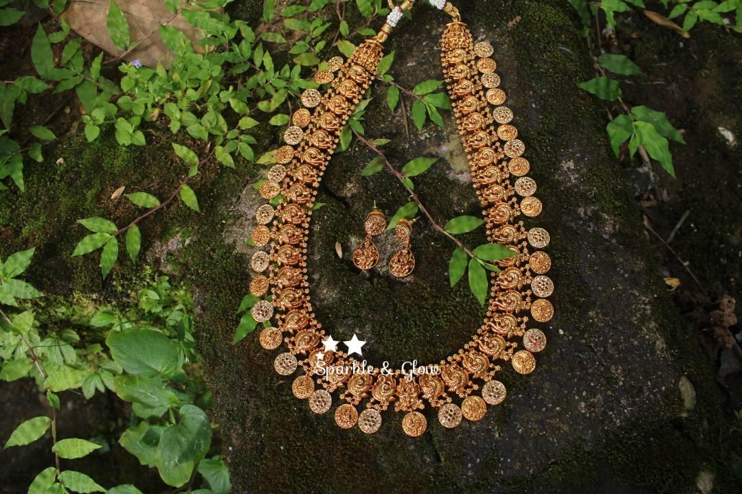 Gold alike polished peacock style lakshmi coin haram with stones - Sparkle and Glow