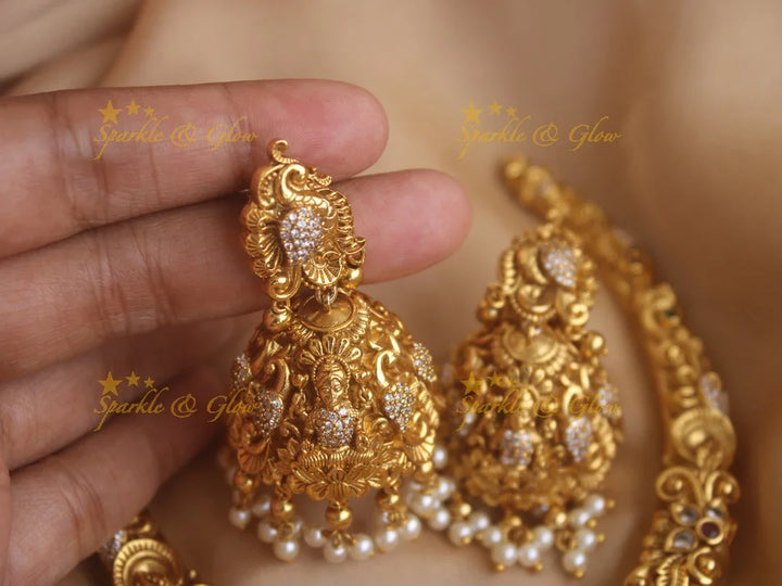 Beautiful Gold alike Lakshmi and peacock carved short necklace with pearls and gold beads - Sparkle and Glow