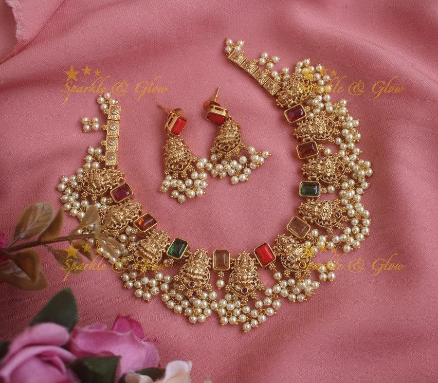 Exquisite gold alike Lakshmi carved short necklace with multi colour stones pearls - Sparkle and Glow