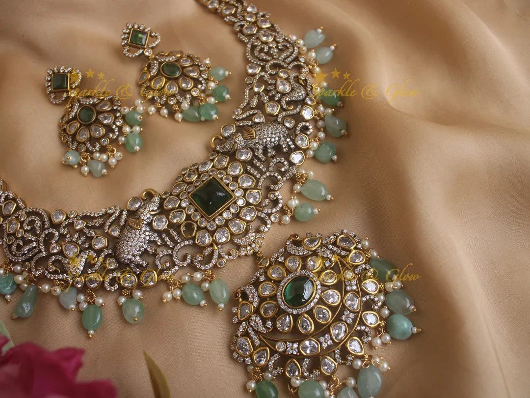 Statement Elephant carved Victorian AD necklace with green stone and mint green beads - Sparkle and Glow
