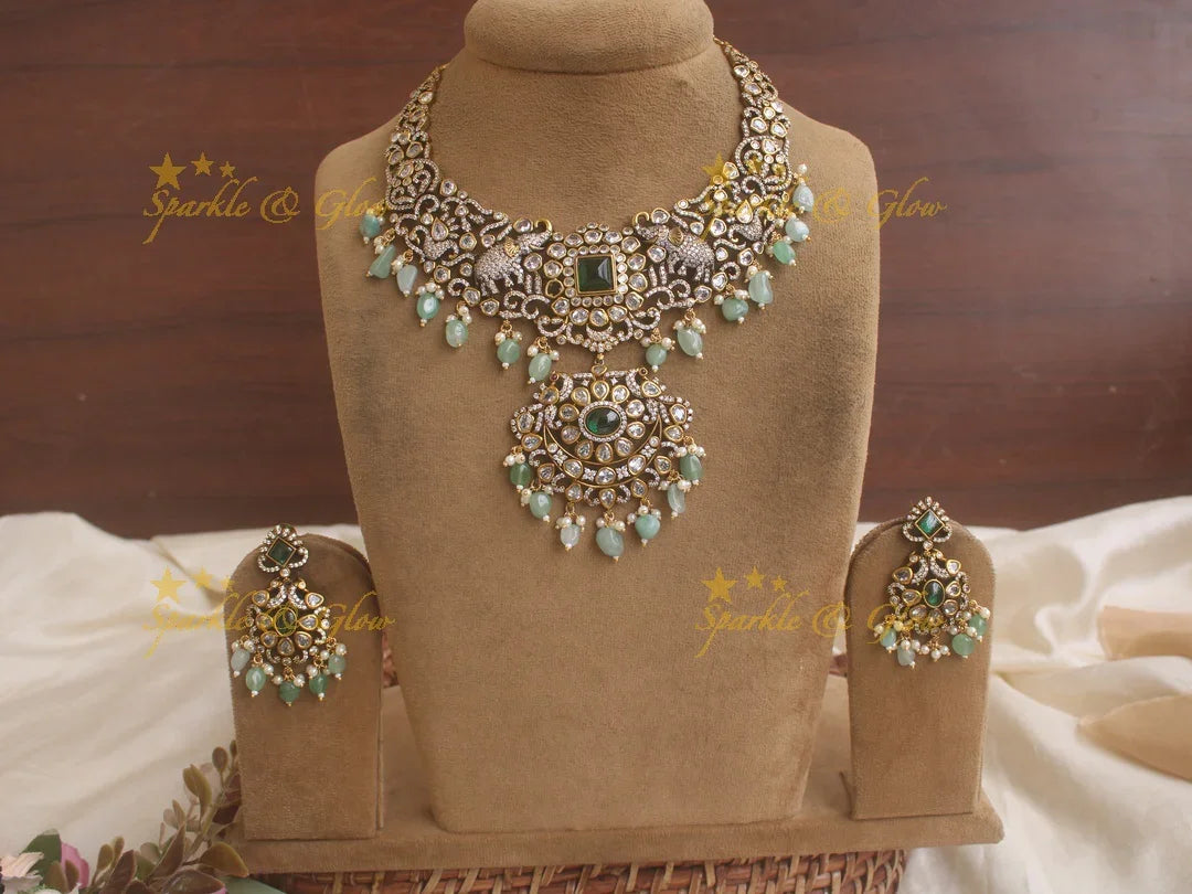 Statement Elephant carved Victorian AD necklace with green stone and mint green beads - Sparkle and Glow