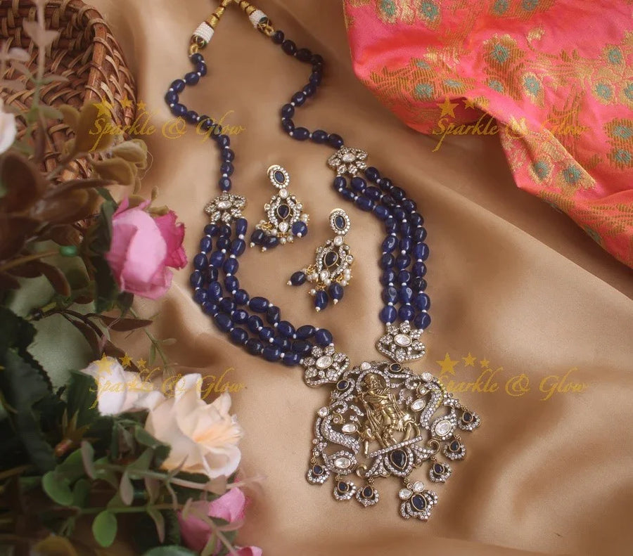 Elegant Krishna playing flute pendent Victorian AD haram with multi layer blue beads chain - blue - Sparkle and Glow