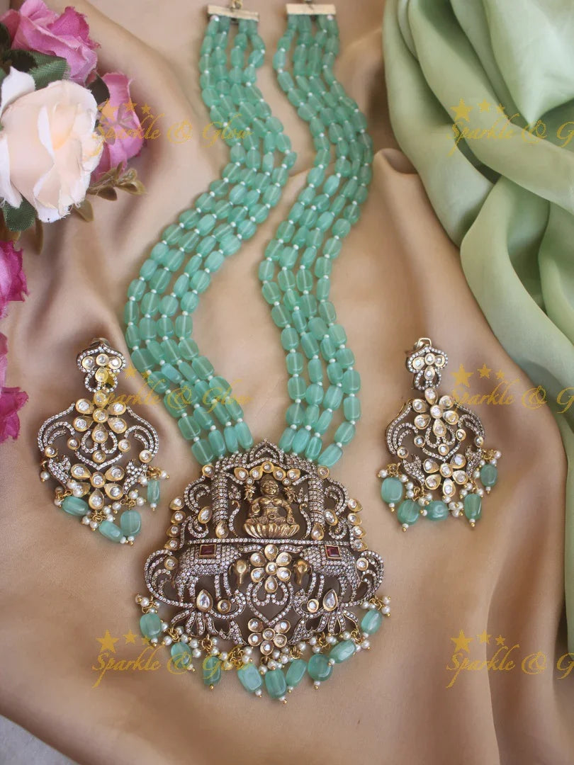Exquisite Lakshmi carved pendent Victorian AD haram with multi layer beads chain - sea blue - Sparkle and Glow