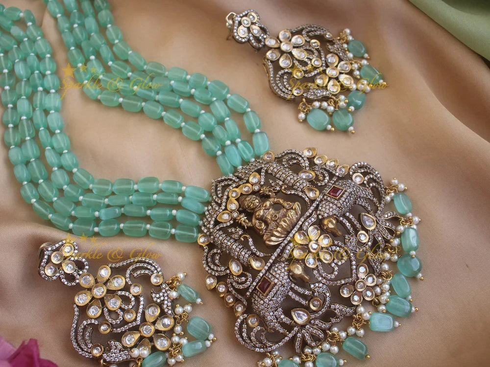 Exquisite Lakshmi carved pendent Victorian AD haram with multi layer beads chain - sea blue - Sparkle and Glow