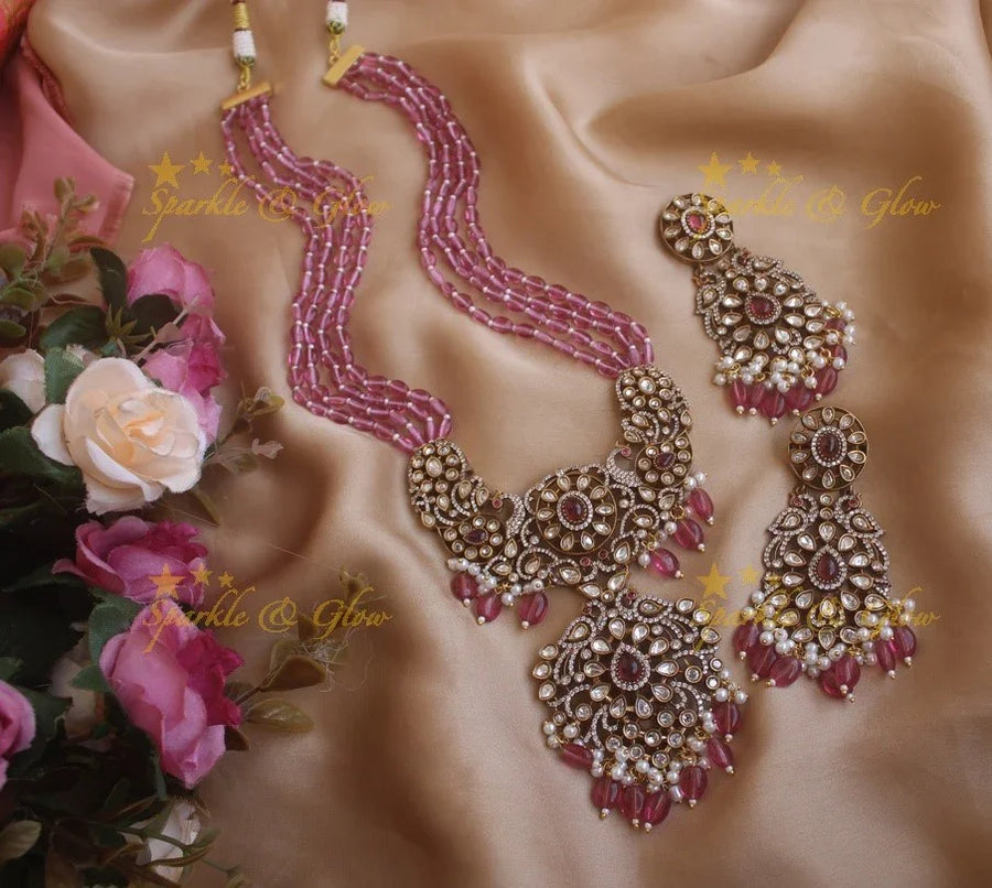 Exquisite grand Peacock pendent Victorian AD haram with multi layer pink beads chain - pink - Sparkle and Glow