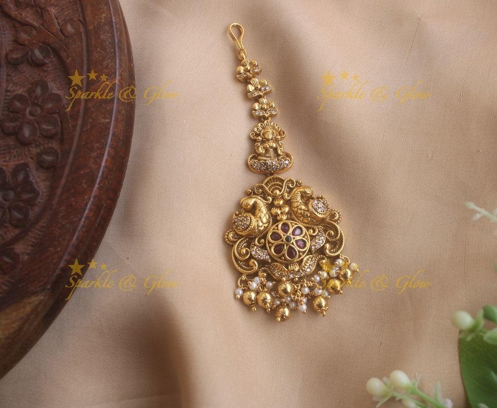 Gold alike Lakshmi peacock maang tikka with cz stones ruby and gold beads - Sparkle and Glow