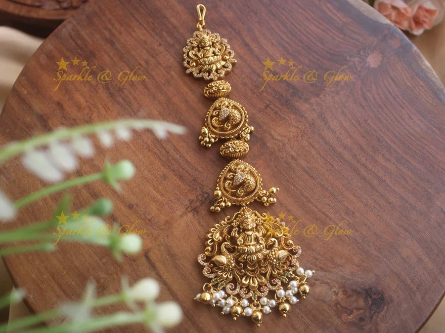 Beautiful Gold alike Lakshmi peacock carved maang tikka with cz stones and gold beads - Sparkle and Glow