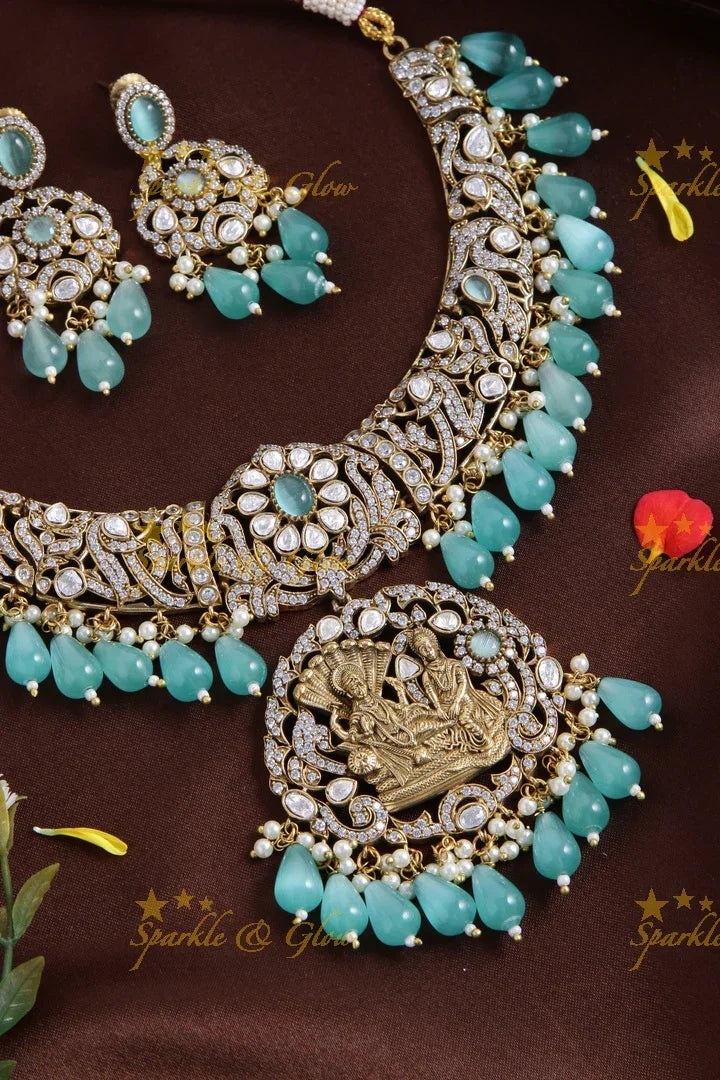 Gorgeous Lakshmi Narayan pendent Victorian AD short necklace with sea blue beads - Sparkle and Glow