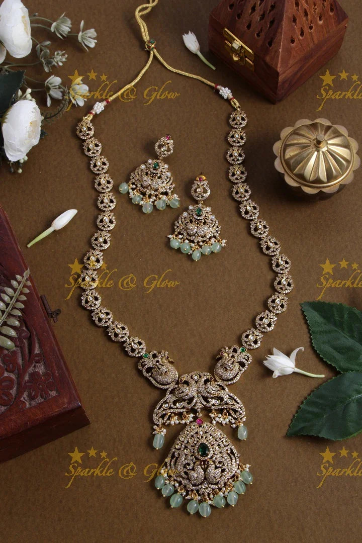 Exclusive Peacock design Victorian AD long necklace with pearls and mint green beads - Sparkle and Glow