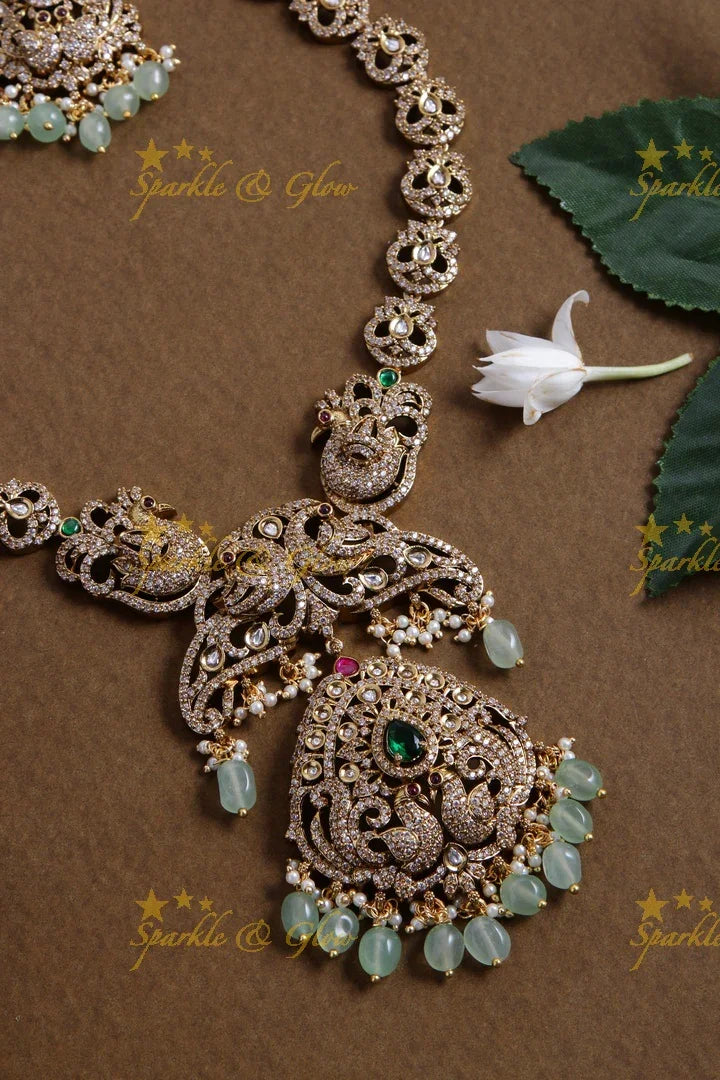 Exclusive Peacock design Victorian AD long necklace with pearls and mint green beads - Sparkle and Glow