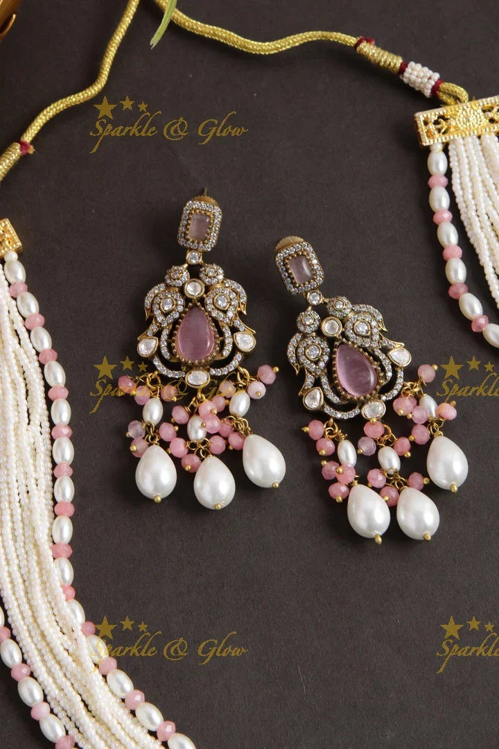 Elegant Peacock elephant pendent Victorian AD haram with multi layer pearl chain and peach white beads - Sparkle and Glow