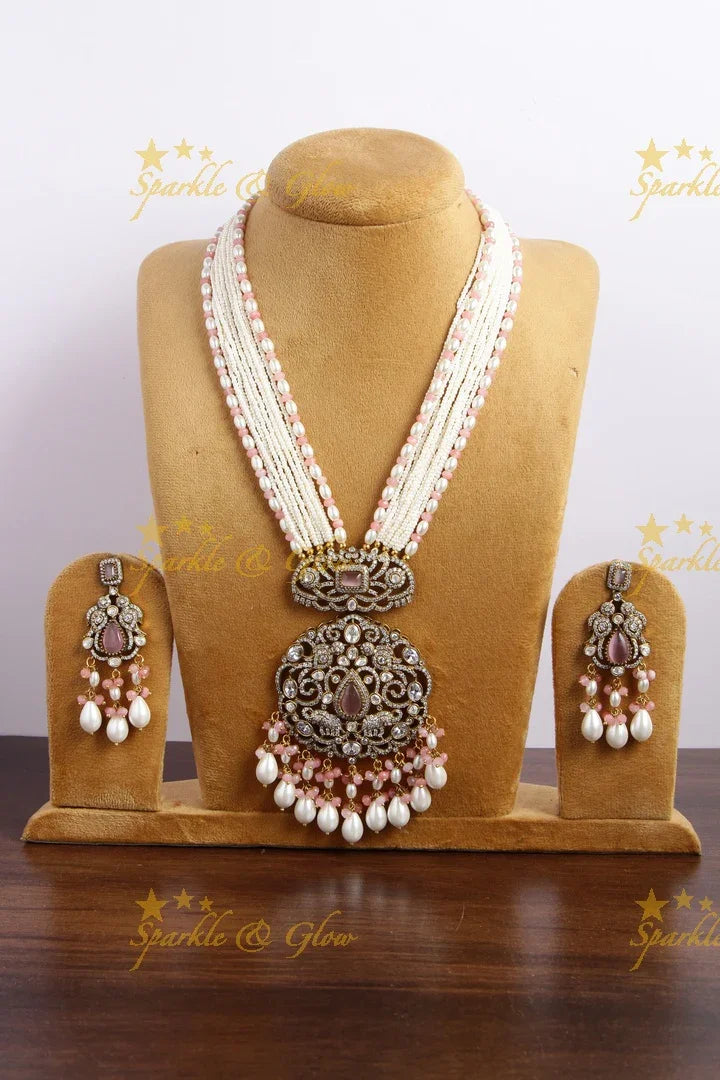 Elegant Peacock elephant pendent Victorian AD haram with multi layer pearl chain and peach white beads - Sparkle and Glow