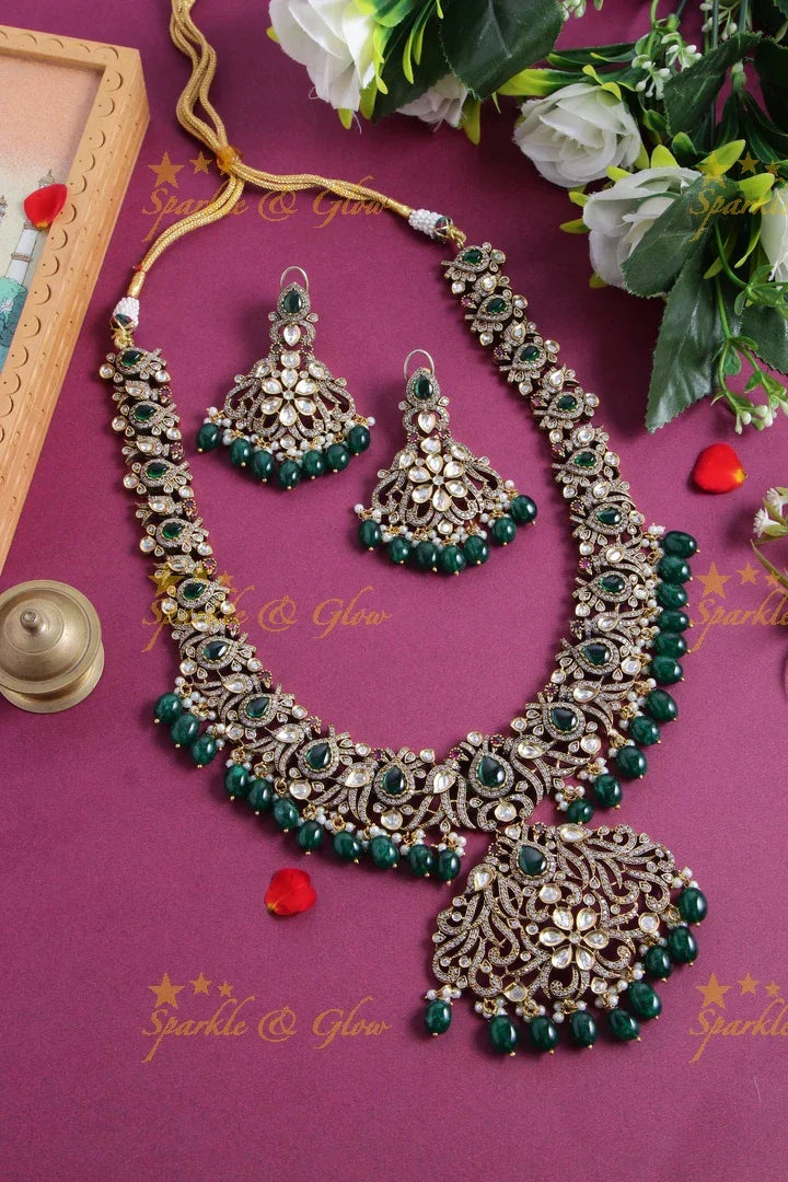 Gorgeous peacock and floral design Victorian AD long necklace with sea blue stones and beads - Sparkle and Glow