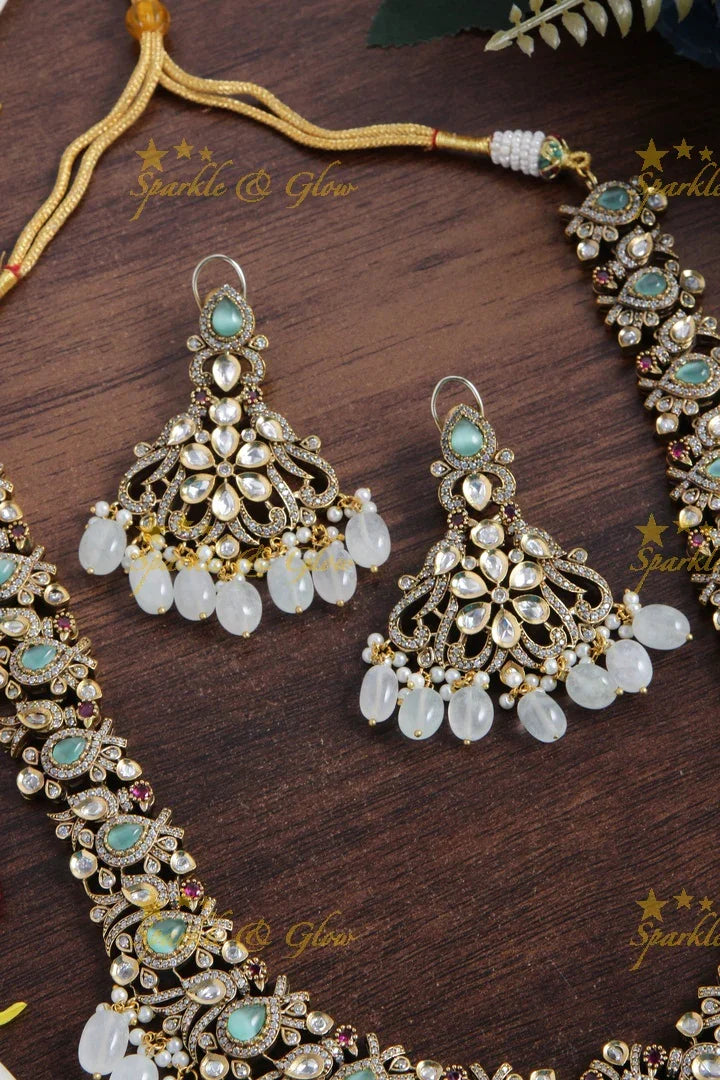 Gorgeous peacock and floral design Victorian AD long necklace with sea blue stones and beads - Sparkle and Glow