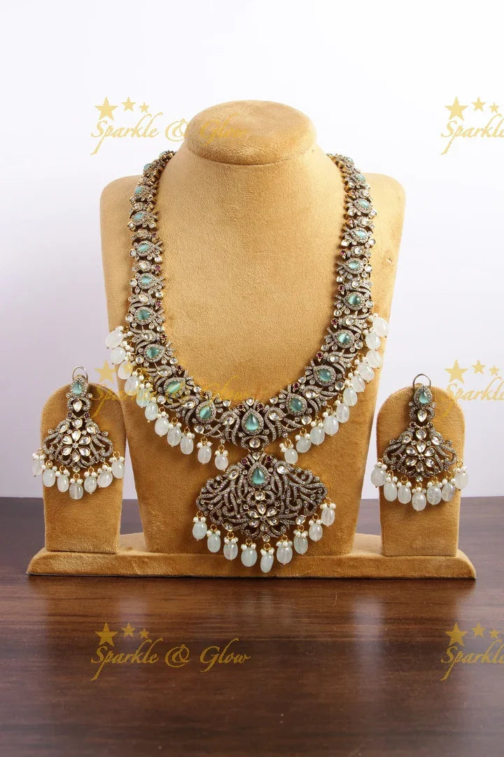 Gorgeous peacock and floral design Victorian AD long necklace with sea blue stones and beads - Sparkle and Glow