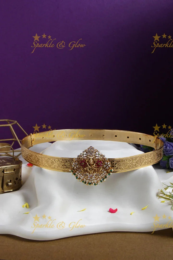 Exquisite Narasimha carved gold alike hipbelt with multi colour stones green beads - Sparkle and Glow