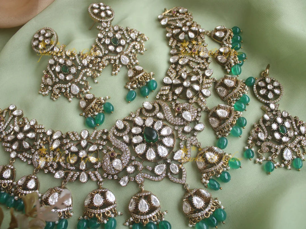 Beautiful peacock design Victorian AD necklace with green beads and with mang tikka - Sparkle and Glow