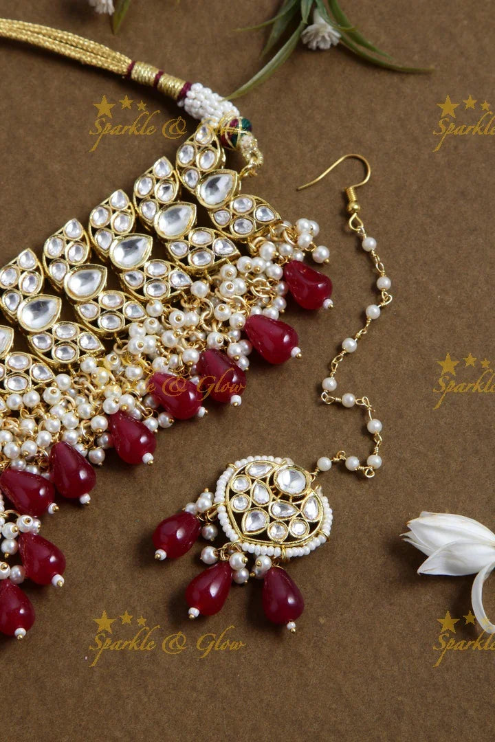 Grand floral design kundan choker with pearls and red beads - Sparkle and Glow