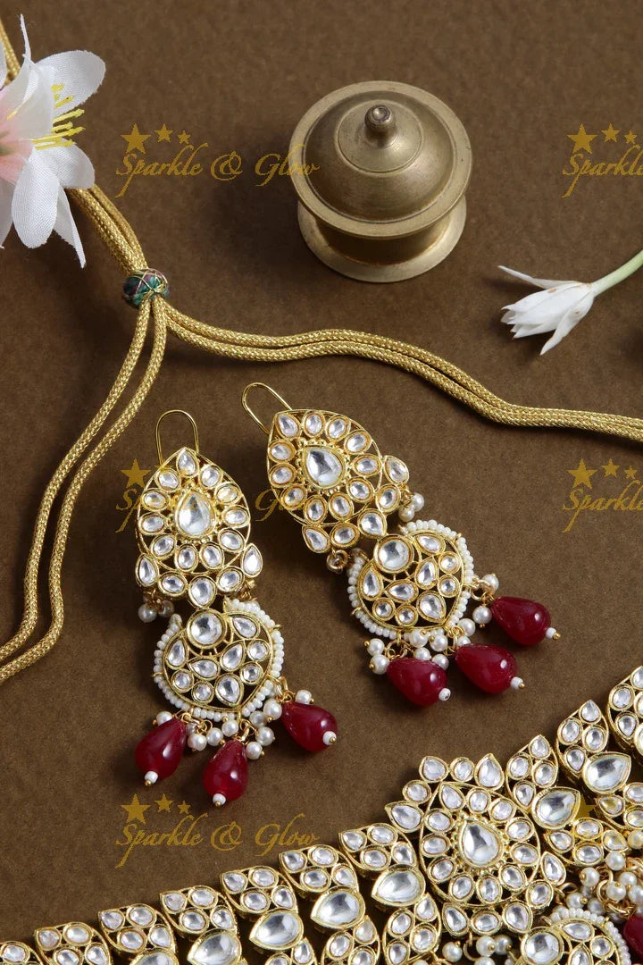 Grand floral design kundan choker with pearls and red beads - Sparkle and Glow