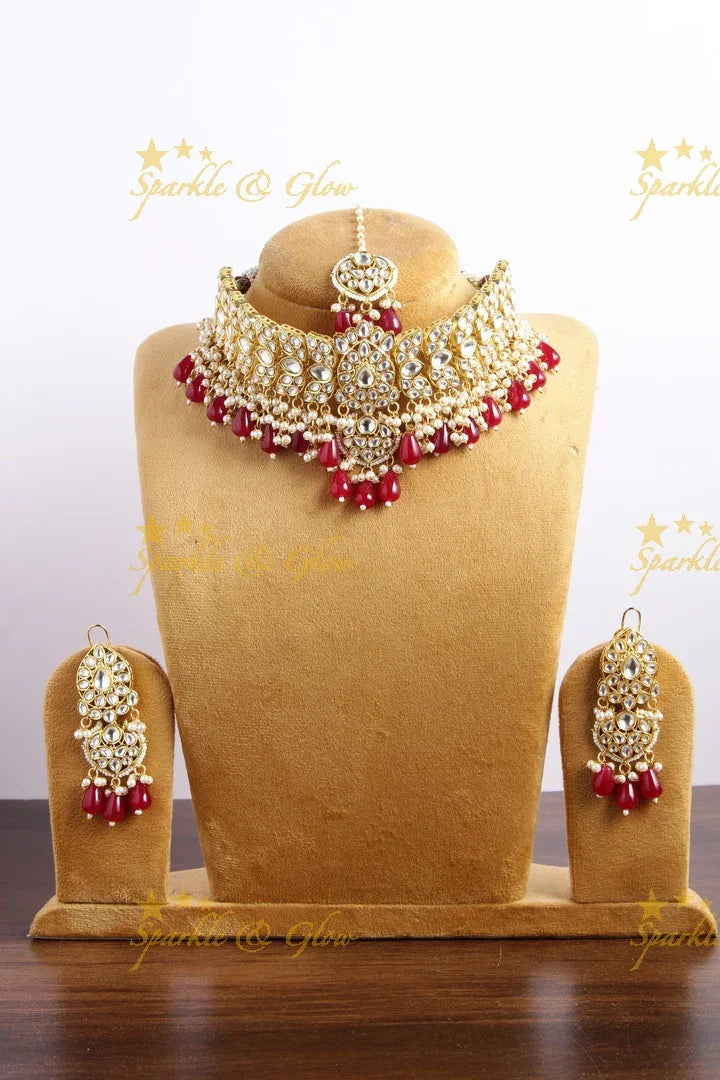 Grand floral design kundan choker with pearls and red beads - Sparkle and Glow