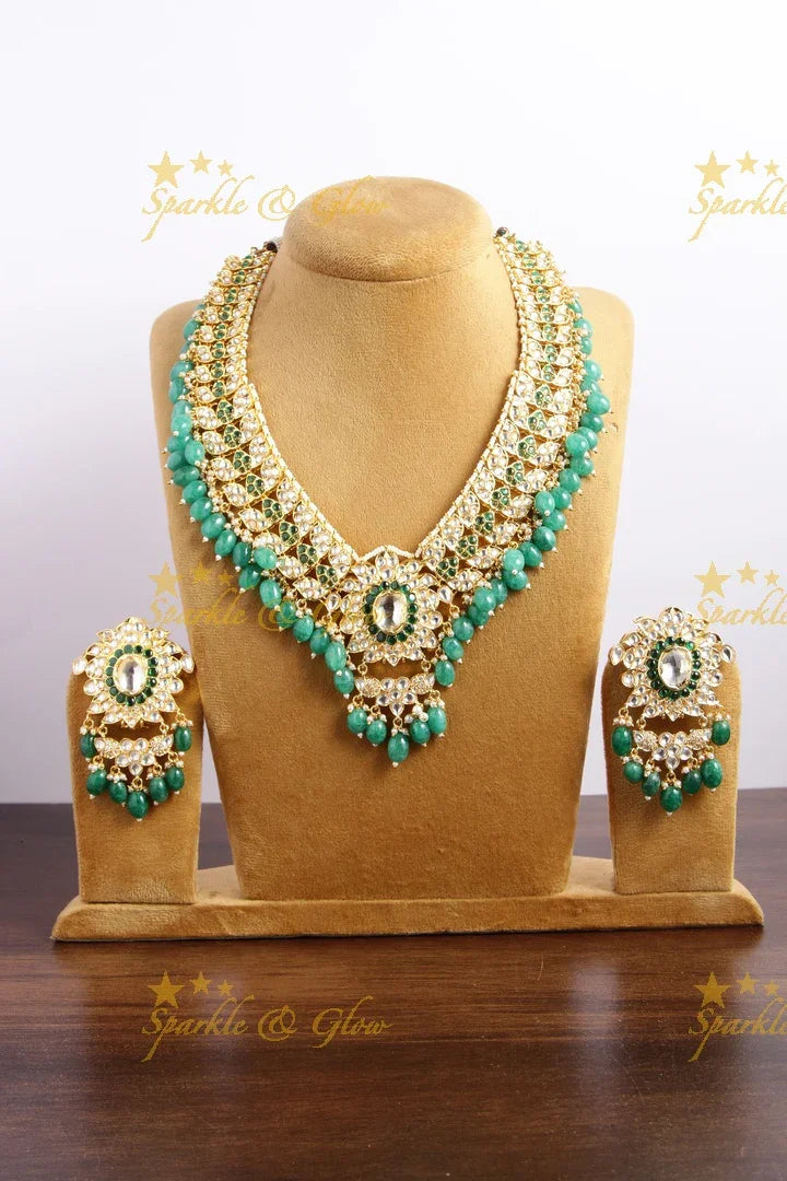 Grand intricate floral design kundan short necklace with pearls green beads - Sparkle and Glow