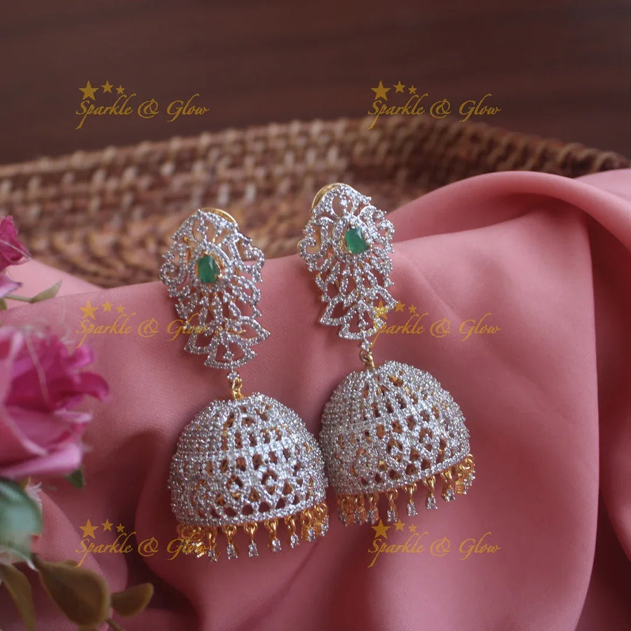 Grand intricate design American diamond jumukas with emerald - Sparkle and Glow