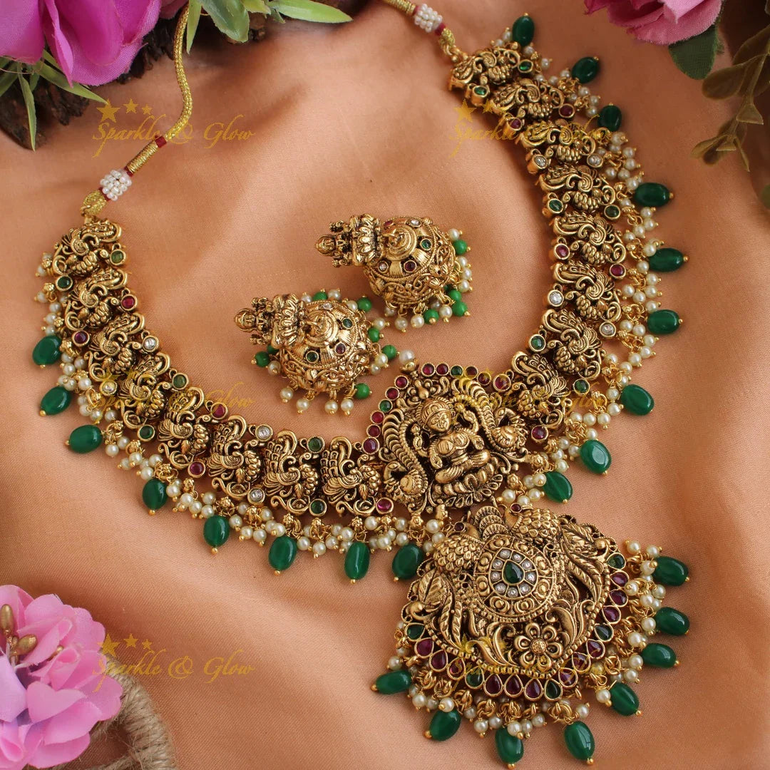 Elegant gold alike Lakshmi short necklace with green beads - Sparkle and Glow