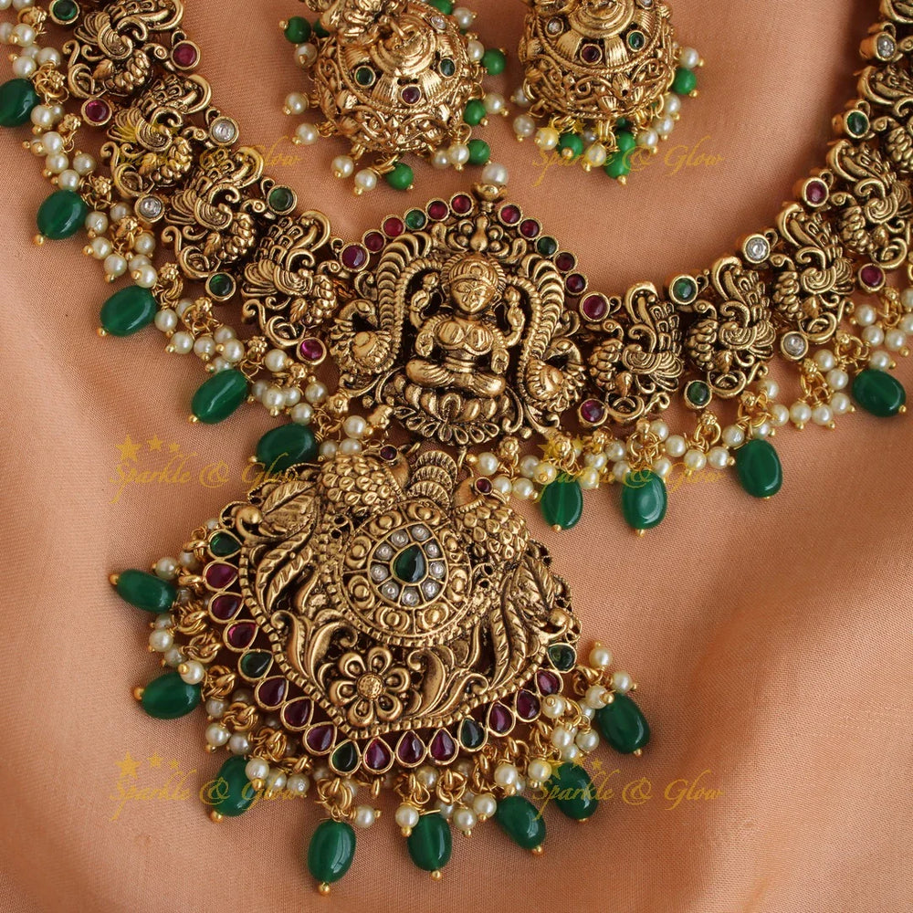 Elegant gold alike Lakshmi short necklace with green beads - Sparkle and Glow