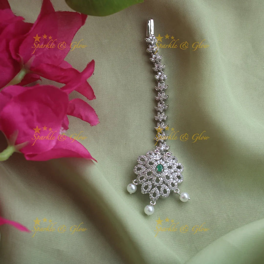 Stunning silver polish peacock water drop maang tikka with pearls and emerald - Sparkle and Glow