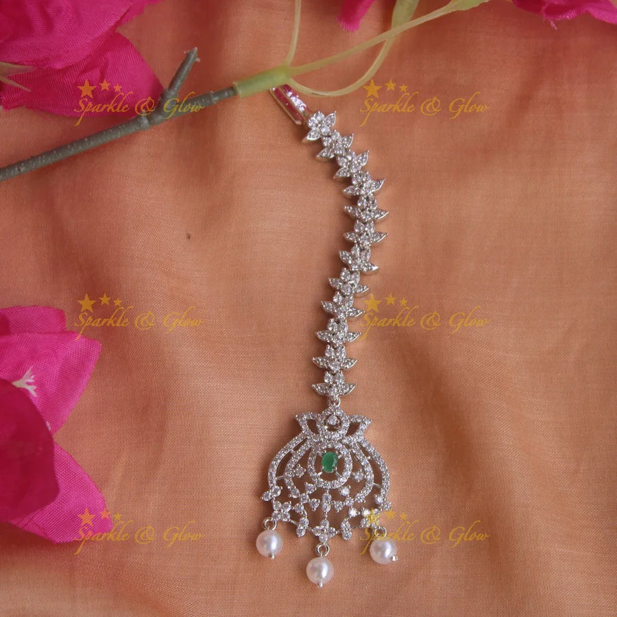 Exclusive silver polish floral and leaf maang tikka with pearls and ruby - Sparkle and Glow