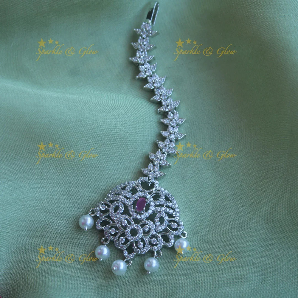 Sparkling silver polish floral maang tikka with pearls and ruby - Sparkle and Glow