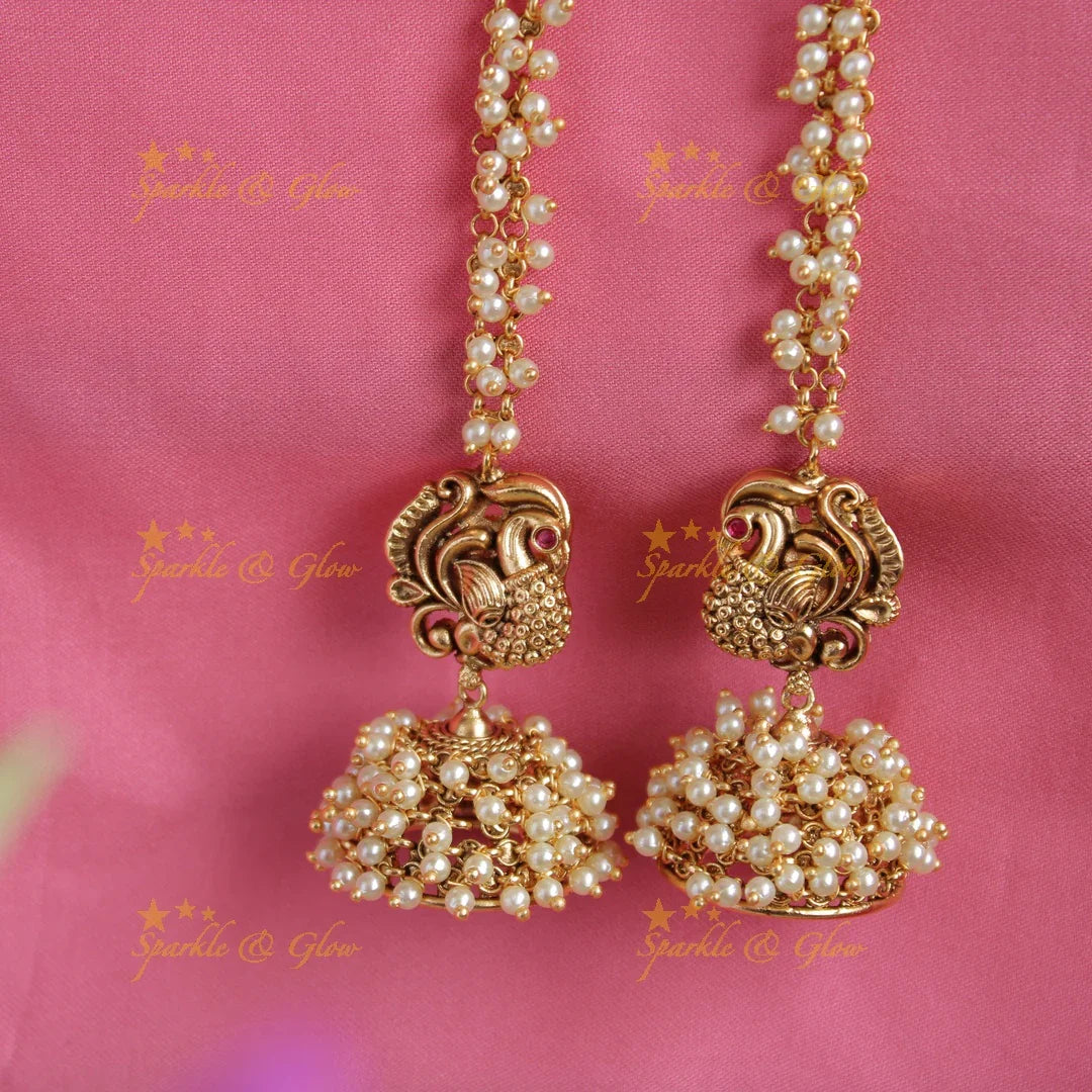 Elegant gold alike peacock carved cluster pearl jhumukas with earchain - Sparkle and Glow