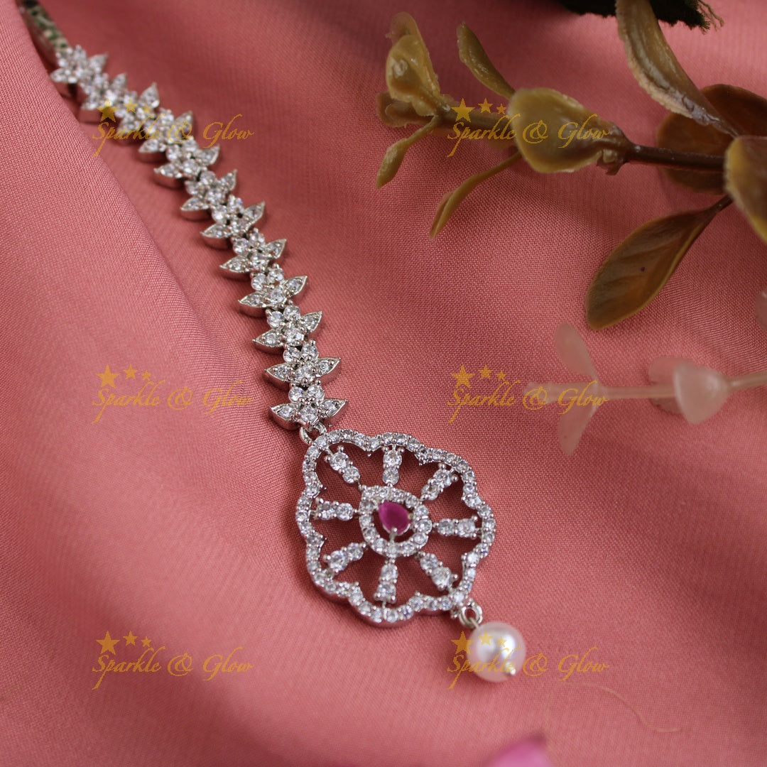 Elegant silver polish flower design maang tikka with pearl and ruby