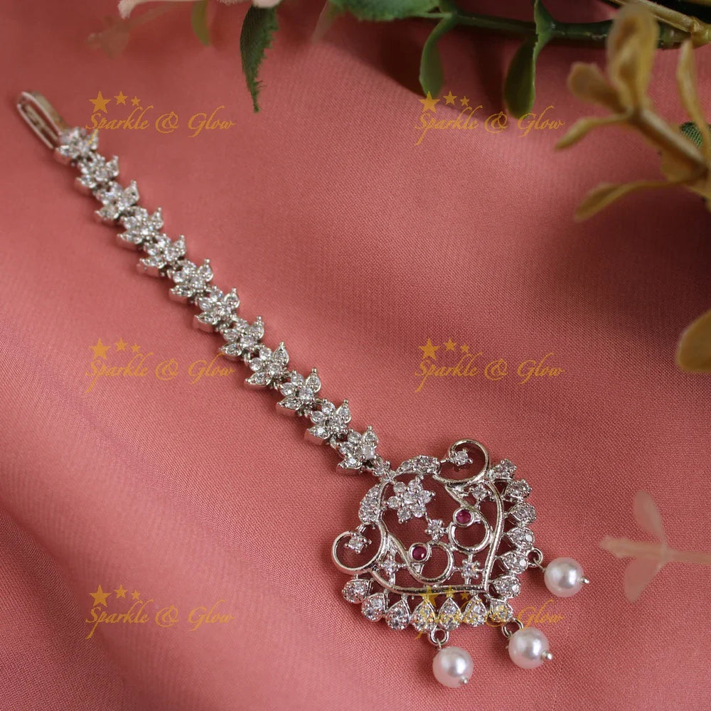 Beautiful silver polish peacock and flower design maang tikka with pearl drops - Sparkle and Glow