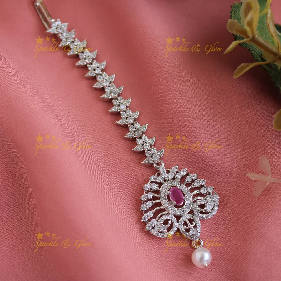 Exclusive silver polish peacock feather design maang tikka with pearl and emerald - Sparkle and Glow