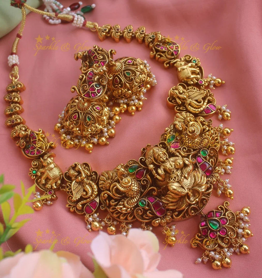 Grand intricately carved Lakshmi elephant peacock Jadau short necklace with gold beads - Sparkle and Glow