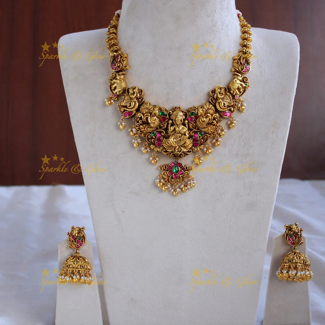 Grand intricately carved Lakshmi elephant peacock Jadau short necklace with gold beads - Sparkle and Glow