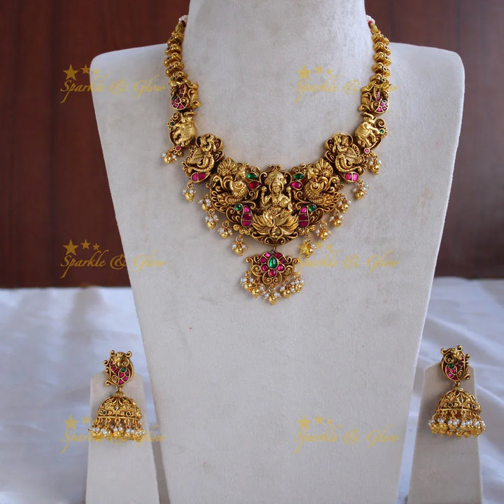 Grand intricately carved Lakshmi elephant peacock Jadau short necklace with gold beads - Sparkle and Glow