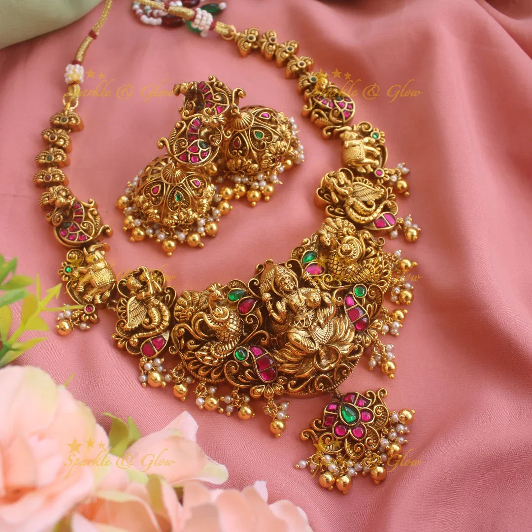 Grand intricately carved Lakshmi elephant peacock Jadau short necklace with gold beads - Sparkle and Glow