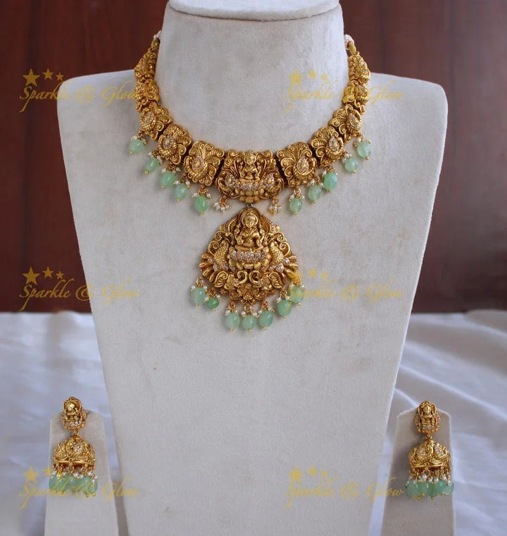 Stunning gold alike Lakshmi peacock carved short necklace with CZ stones and mint green beads - Sparkle and Glow